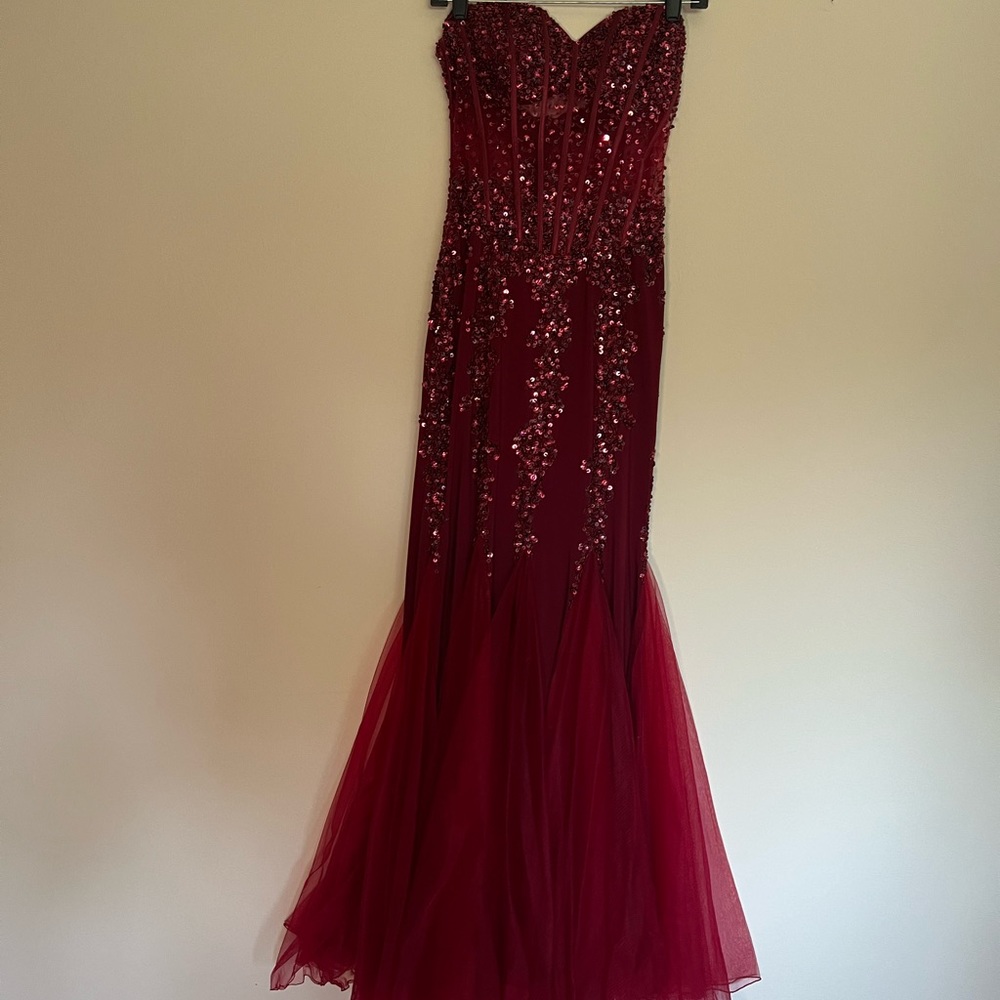 A red Joey couture dress